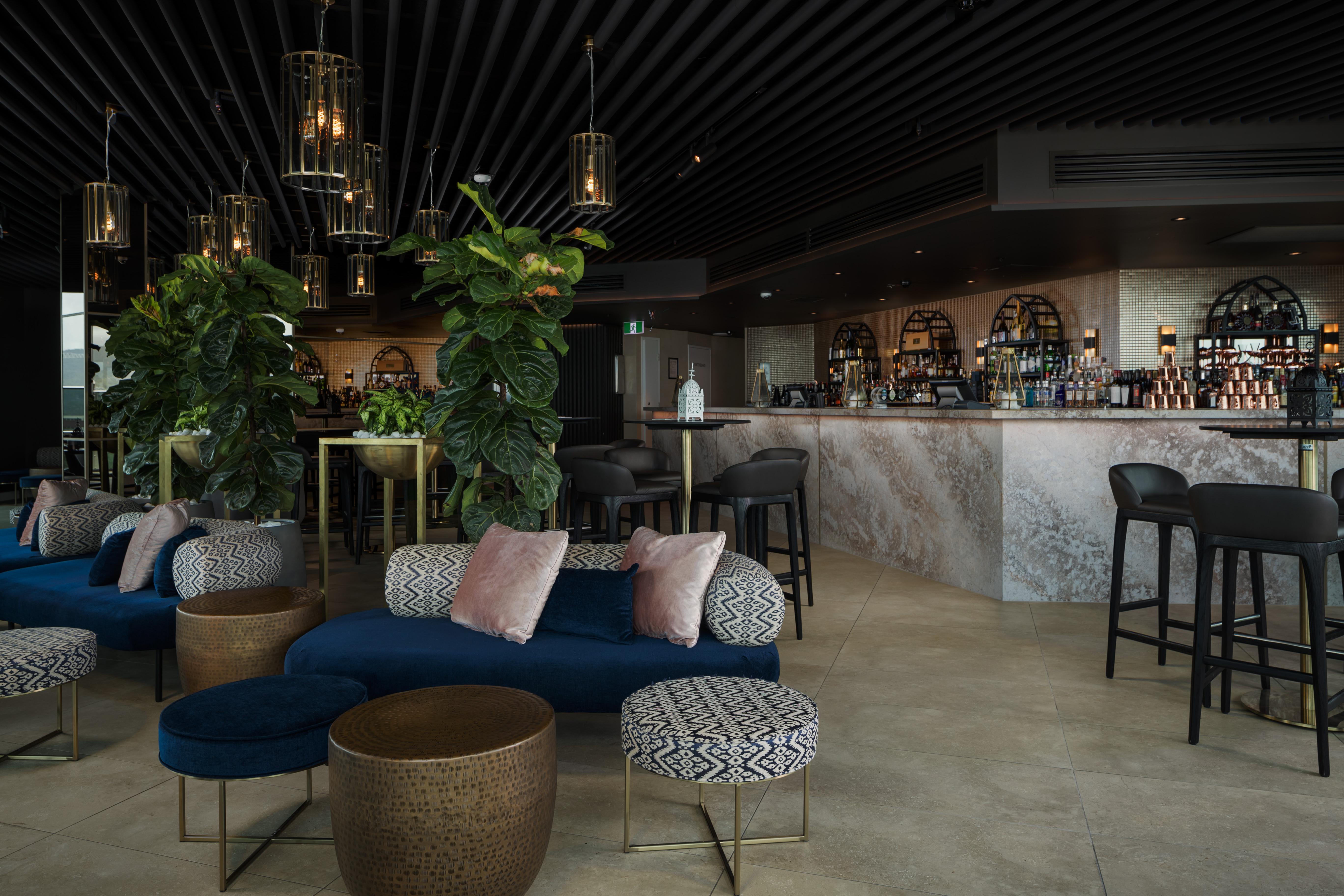 Crystalbrook Riley Hotel Cairns Bagian luar foto The interior of the bar