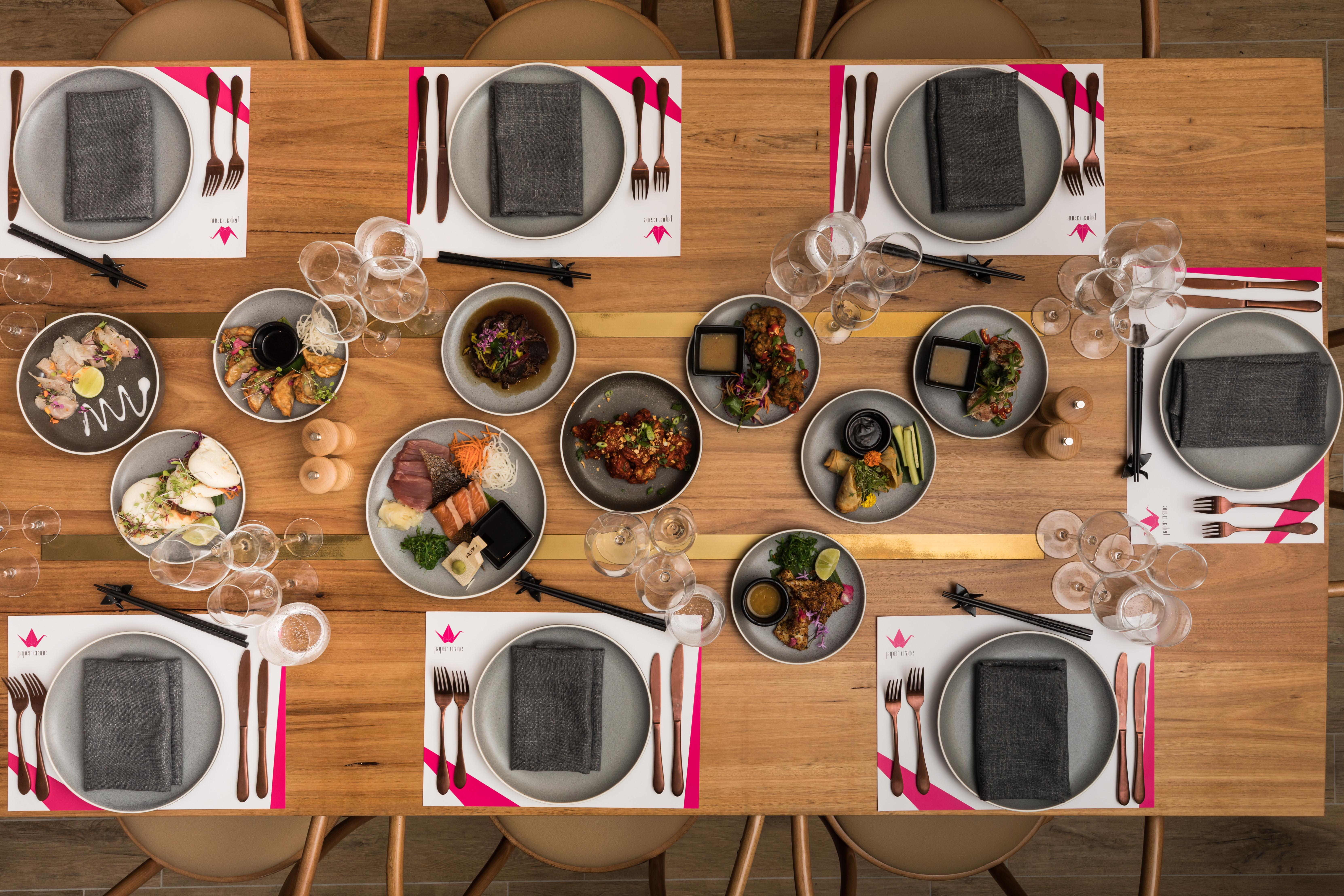 Crystalbrook Riley Hotel Cairns Bagian luar foto A table at the restaurant