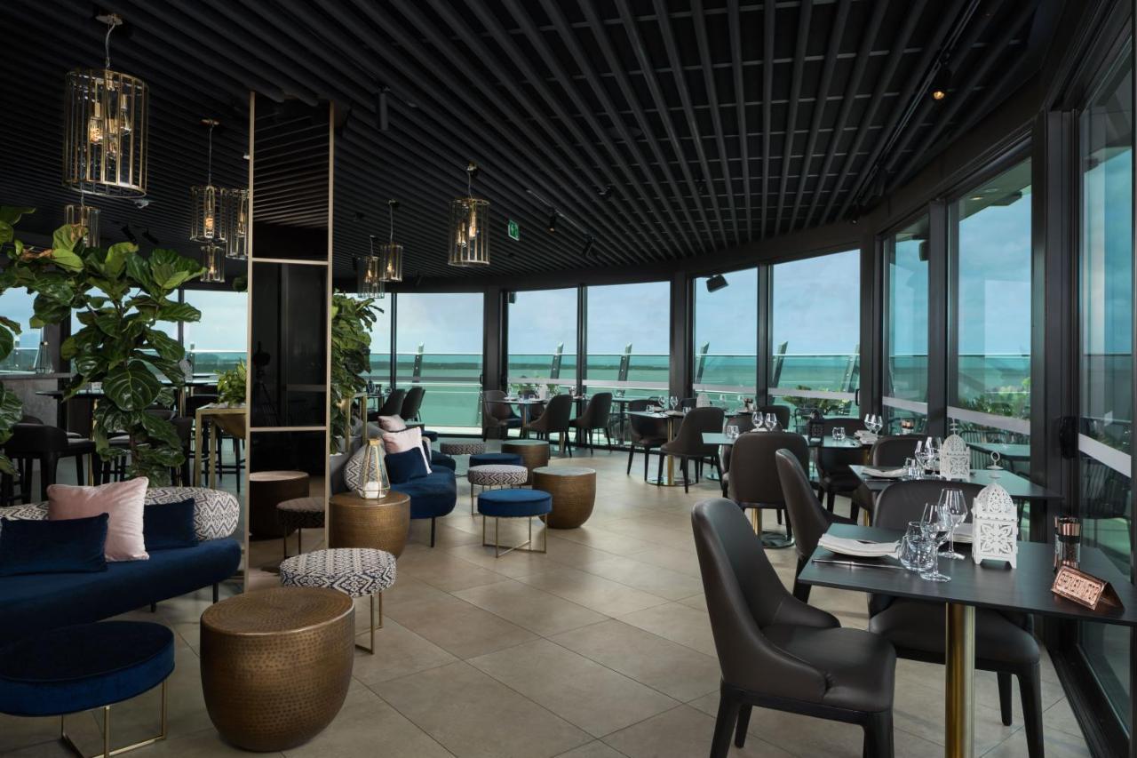 Crystalbrook Riley Hotel Cairns Bagian luar foto The restaurant